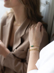 Gouden armband met bewerkte ovale schakels van Ellen Beekmans, elegant en verfijnd sierstuk voor dames