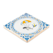 Decoratief tegeltje van StoryTiles met Droomvlucht ontwerp, 10x10 cm, kleurrijk en gedetailleerd muurdecoratie.