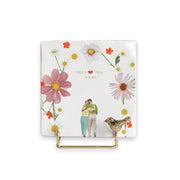 Gouden vogelstandaard van StoryTiles, decoratief en elegant, met een gouden afwerking en gedetailleerd ontwerp.