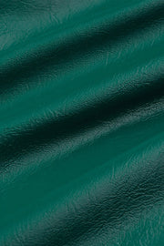 Groene Glitz 219 jas van King Louie met botanisch patroon, stijlvolle en opvallende damesjas op een close-up afbeelding
