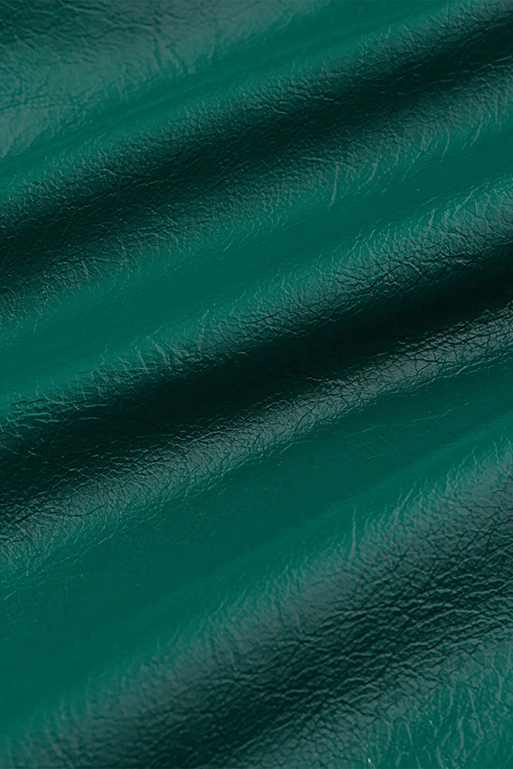Groene Glitz 219 jas van King Louie met botanisch patroon, stijlvolle en opvallende damesjas op een close-up afbeelding