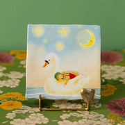 Decoratief tegeltje van StoryTiles met "Loaded with love" ontwerp, maat 10x10cm, kleurrijk en artistiek muurdecor.