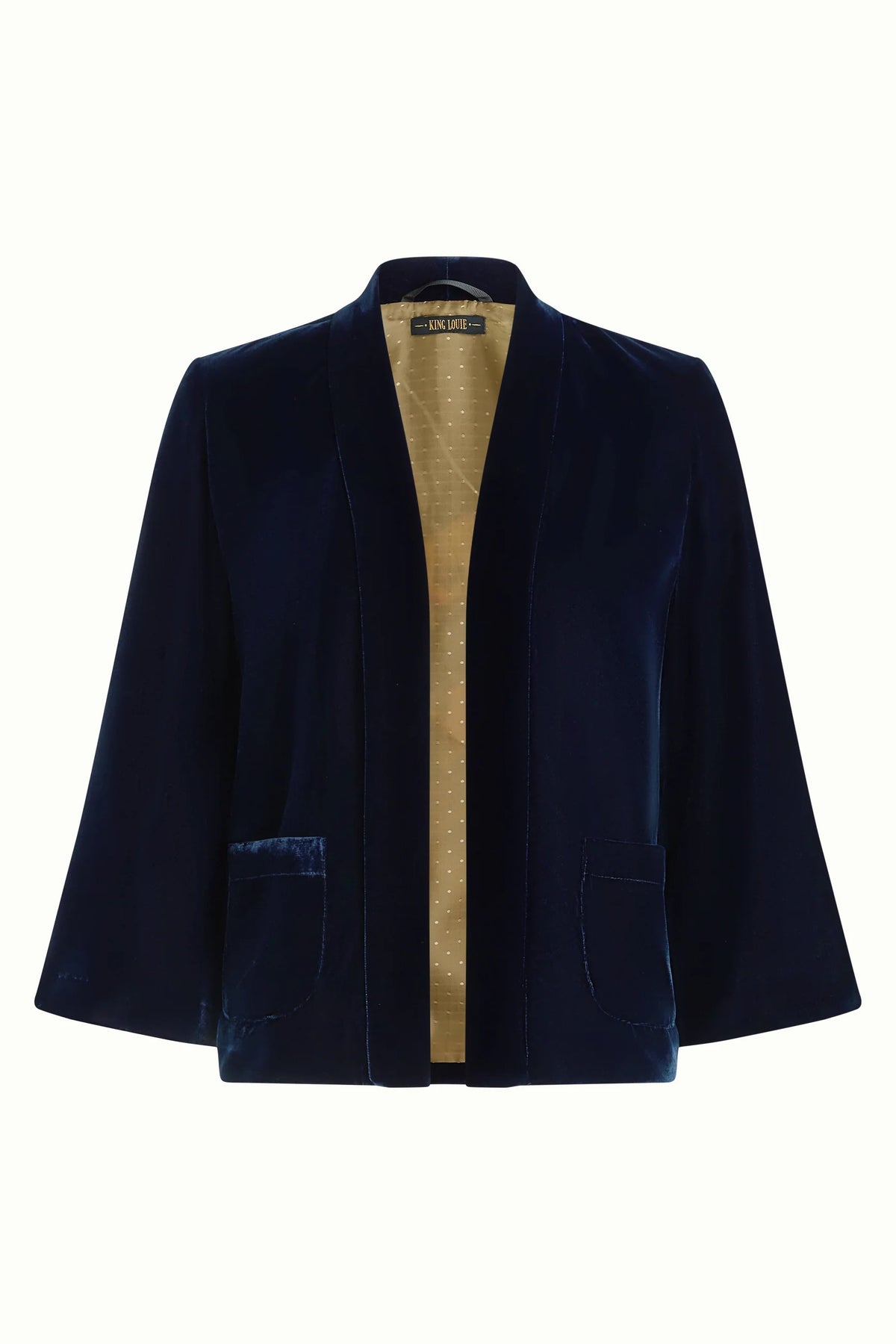 Lichtblauwe Noor Gamine jas van King Louie met knopen en korte mouwen, gedragen door een model op een witte achtergrond