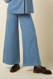 Lila Peppa Pants Petit Birch Cord van King Louie, zachte katoenen broek met peppa print en elastische taille.