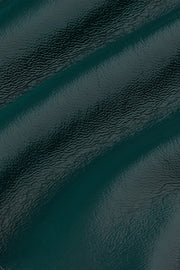 Groene Reily Jacket Shine 211 van King Louie, alpine kleur, getoond in close-up met details van de stof en ontwerp.