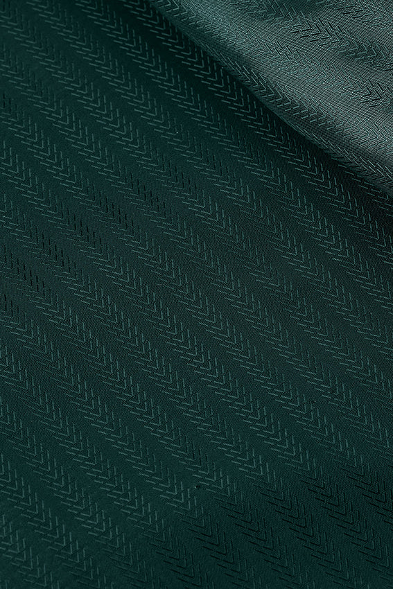 Alpine groene Reily Jacket Shine 211 van King Louie, lichtgewicht jas met glanzende afwerking, zichtbaar op de afbeelding.