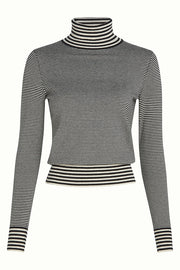Zwarte rollneck top Sere 001 van King Louie, getoond op een model, close-up van de zachte stof en comfortabele pasvorm.