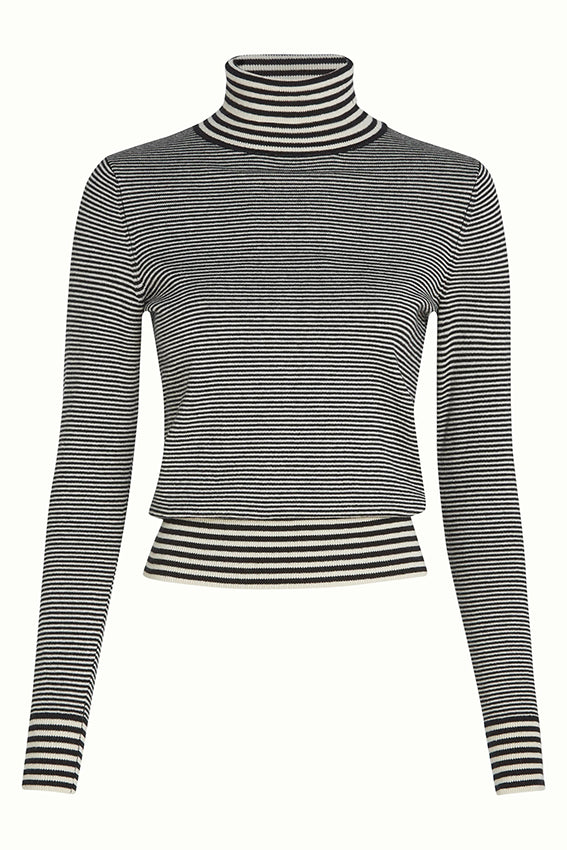 Zwarte rollneck top Sere 001 van King Louie, getoond op een model, close-up van de zachte stof en comfortabele pasvorm.