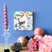 StoryTiles Sheltering Leaves 10x10 tegel met bladerenmotief in groene en natuurlijke tinten