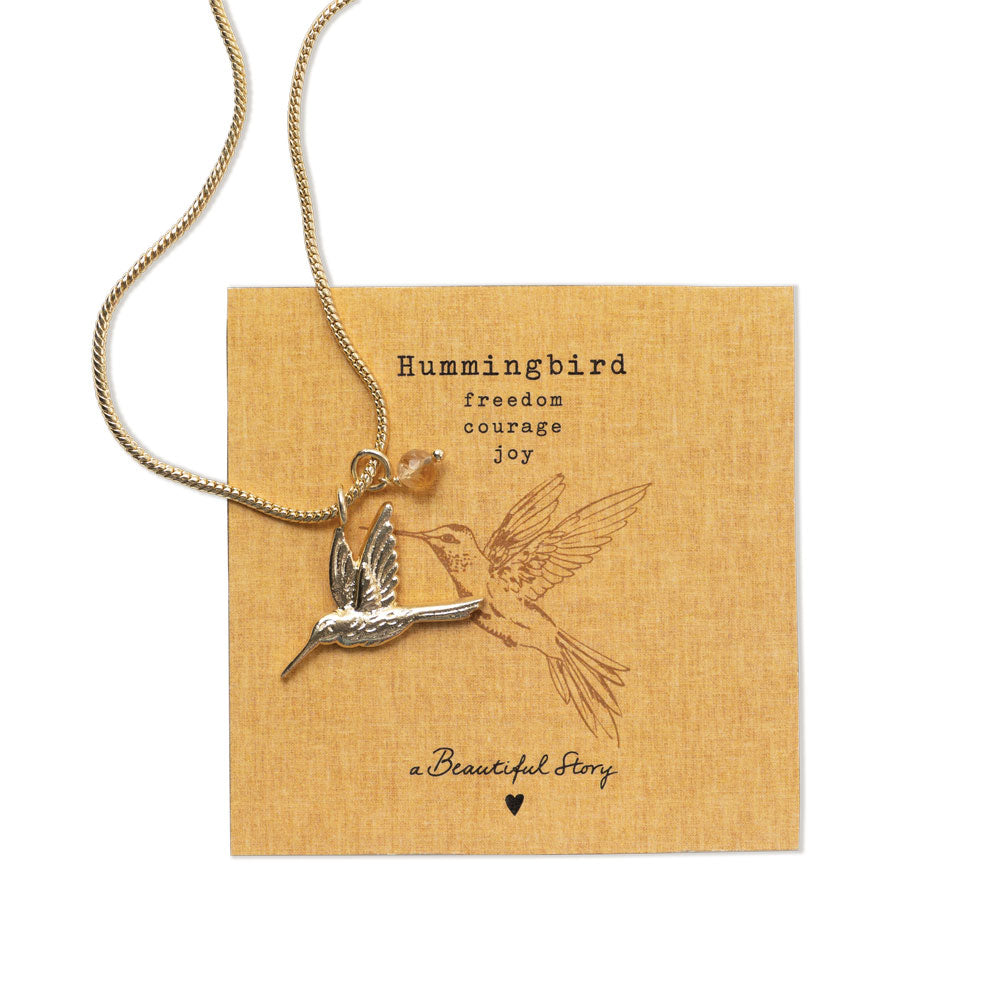 Gouden Wild Hummingbird Citrine ketting van a Beautiful Story met een grote citrien hanger en een bijpassende ketting.
